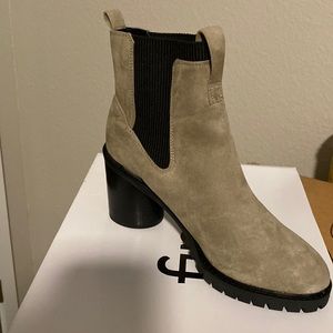 Woman’s gray chunky suede boot